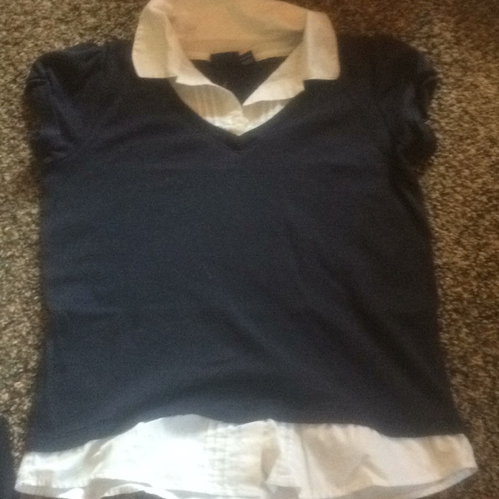 Uniform shirt.